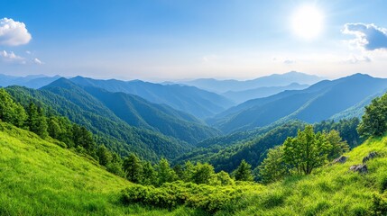 Fototapeta premium Lush Green Mountain Landscape Under Bright Blue Sky with Rays of Sunlight
