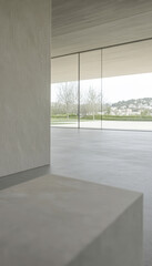 Modern architecture showcased in a spacious interior with large windows and serene landscape views