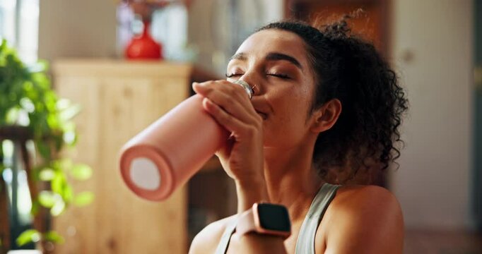 Home, woman and fitness with drinking water for nutrition, hydration or wellness for healthy body. House, female person and break with thirst for h2o liquid, detox or self care after exercise session