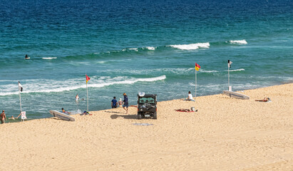 A view of City Beach in Wollongong, New South Wales, Australia while lifeguards patrol to keep swimmers safe
