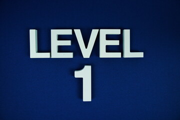 Level 1, Level One alphabet letters on navy blue background