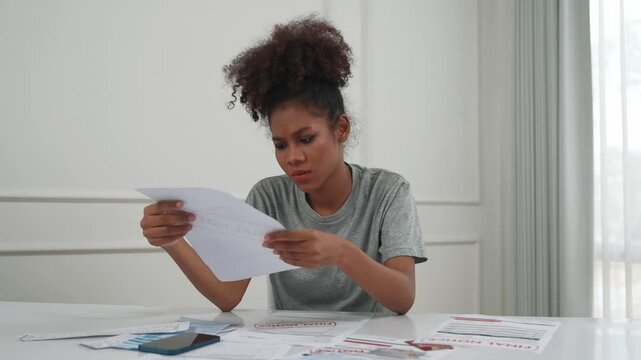 Stressed young woman has financial problems with credit card debt to pay crucial show concept of bad personal money and mortgage pay management crisis.