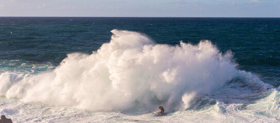 Powerful storm waves in Porto Moniz, on the Madeira Atlantic coastline, Portugal