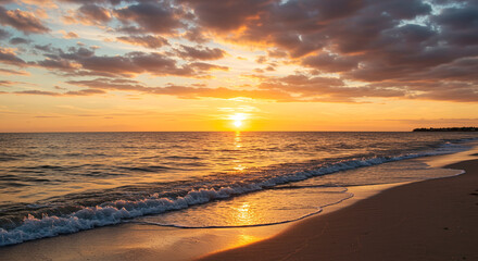 Obraz premium Soft sunset colors grace the beach as the sun sets. Sunset beach scenery Background.