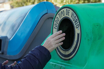 Person just threw glass into the recycling bin