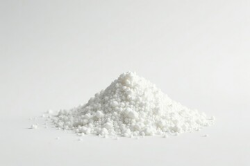 Pile of white granulated sugar on white background, background, close up, candy