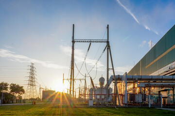 Sunset over a power substation and industrial coal powerplant facility in indonesia
