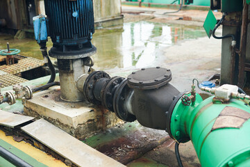 Industrial fluid pump with piping & valves. Essential equipment for process & infrastructure in...