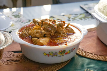 Delicious Chicken Curry in a Traditional Decorative Bowl 