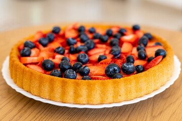 Strawberry pie top view. Beautiful fruit cake on the table. Homemade cakes
