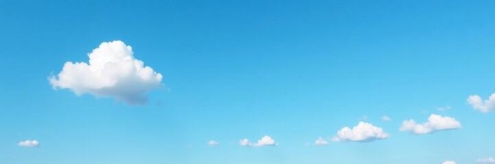 A solitary white cloud drifts lazily across a bright blue sky with a few scattered clouds in the distance, weather, landscape