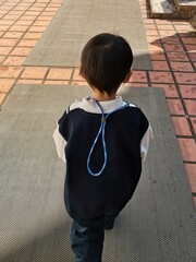a boy with mask strap routine