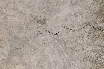 Background of destroyed concrete path, gray concrete, concrete texture, close-up. Natural photo. Old concrete slab