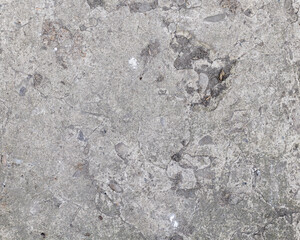 Background of destroyed concrete path, gray concrete, concrete texture, close-up. Natural photo. Old concrete slab