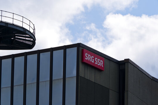 Facade of industrial building of Swiss national television and radio company named SRF SSR at Swiss City of Z&uuml;rich on a cloudy spring day. Photo taken March 31st, 2025, Zurich, Switzerland.