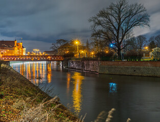 Fototapeta premium Night View of Oder River and Historic Architecture in Wroclaw, Poland