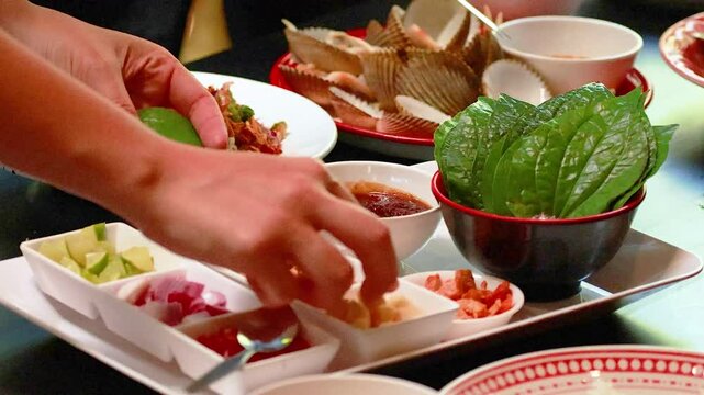 Preparing Miang Kham in Phuket, Thailand