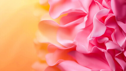 Obraz premium Soft pink and yellow gradient background with delicate fabric folds, creating serene and calming atmosphere. Perfect for design projects or as soothing backdrop