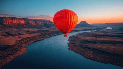 Fototapeta premium Sunrise Hot Air Balloon Ride Over Scenic River Canyon