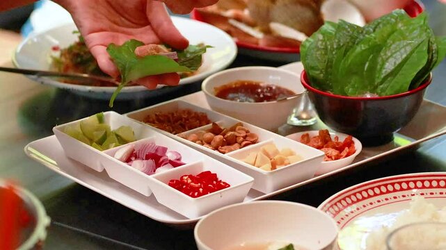 Preparing Miang Kham in Phuket, Thailand
