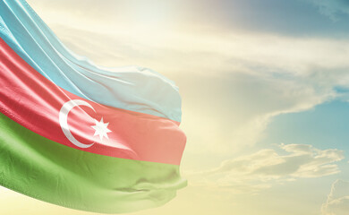 Azerbaijan flag wave in soft clouds National flag beautifully waving in the sky. Azerbaijan national flag for independence day.