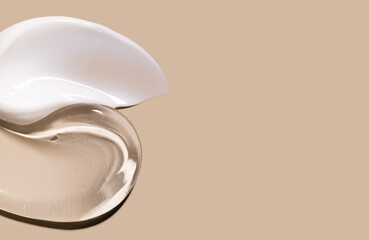 creamy texture of cosmetic samples on a pastel beige background