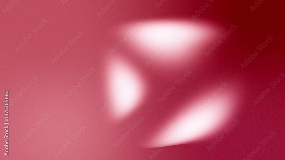 Aufkleber an abstract background consisting of various shades of red with several blurred white areas that cre