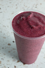 A closeup of a berry smoothie.