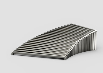 A curved arrangement of staple pins creates a sleek and abstract metallic pattern.