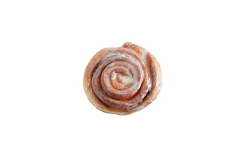 A top down view of a cinnamon roll, against a white background.