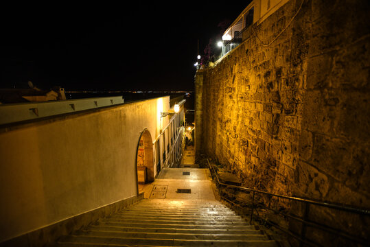 Nighttime Steps on Rua Norberto de Ara&uacute;jo leading to Alfama - Lisbon, Portugal