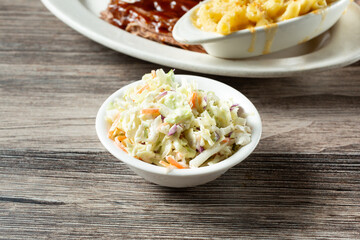 A view of a small bowl of coleslaw.