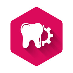 White Tooth treatment procedure icon isolated with long shadow. Tooth repair with gear. Pink hexagon button. Vector