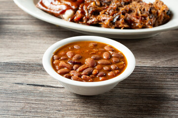 A view of a small bowl of BBQ baked beans.