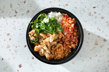 A top down view of a Mexican chicken bowl.