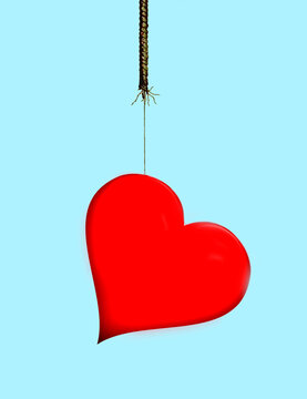 Red heart hanging on a rope against a blue background symbolizing love and relationships