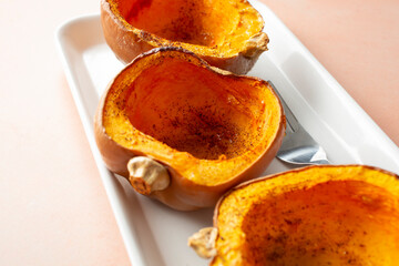A view of a tray of roasted honeynut squash.