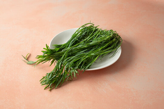 A view of a pile of pipicha on a plate.