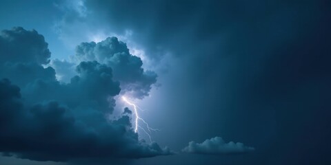 Dramatic Night Sky with a Powerful Lightning Bolt Striking through Dark Clouds