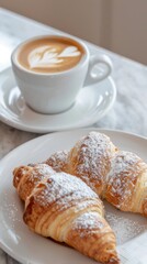 Italian breakfast featuring cornetto and cappuccino served in a cozy cafe setting