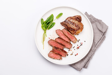 A perfectly cooked sliced striploin steak with a juicy, tender texture