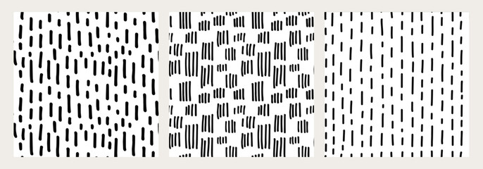 Set of hand drawn seamless black and white patterns with irregular stripes and brush strokes. Modern abstract textures for backgrounds, fabrics, packaging, graphic design. Trendy minimalistic style © Viktoriia