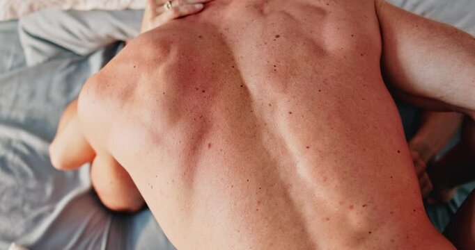 Couple, bedroom and hands on back with sex or intimacy, foreplay and passionate for romance or sexual satisfaction. Man, woman and together making love with top view for desire, bonding and intimate.