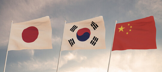 Relations between the countries of Japan, South Korea, and China represented by the concept of three flags waving against a backdrop of a cloudy sky tariffs.3D RENDER.