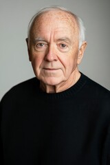 Obraz premium Portrait of a Senior Man with a Thoughtful Expression