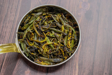 Bhindi Masala, stir-fried okra with Indian spices. Ladyfinger fry. Copy space. Bhendi ki sabzi.