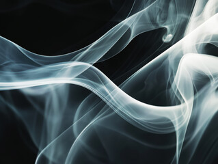 Obraz premium White smoke forms patterns on a dark background