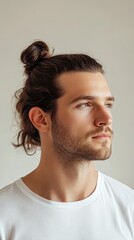 Obraz premium Man with Top Knot Hairstyle, Profile View