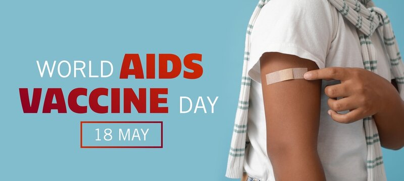 Banner for World AIDS Vaccine Day with African-American child pointing at applied medical patch