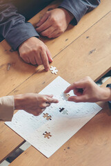 Naklejka premium Vertical Horizon Implement puzzle improve solve synergy organize team building connection plan trust service strategy. Vertical Stakeholders business trust teams hands holding jigsaw puzzle synergy
